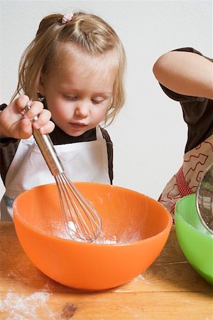 Small girl baking Stock Photo - Premium Royalty-Free, Code: 659-01861755