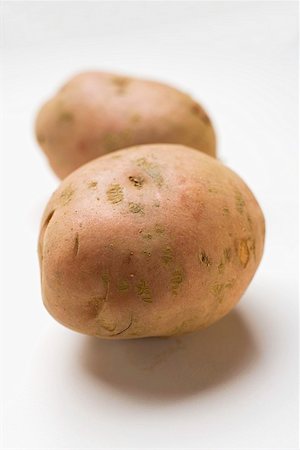 simsearch:659-03532400,k - Two red potatoes Fotografie stock - Premium Royalty-Free, Codice: 659-01862068