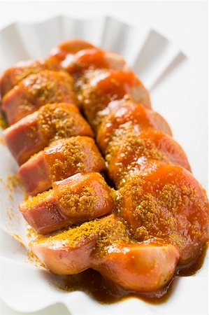 fatty - Currywurst (sausage with ketchup & curry powder) in paper dish Stock Photo - Premium Royalty-Free, Code: 659-01862208