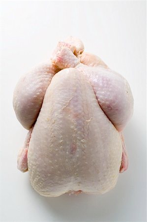 Fresh oven-ready chicken Fotografie stock - Premium Royalty-Free, Codice: 659-01862241
