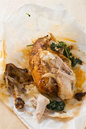 simsearch:659-01854801,k - Half a roast chicken with parsley partly eaten Fotografie stock - Premium Royalty-Free, Codice: 659-01862254