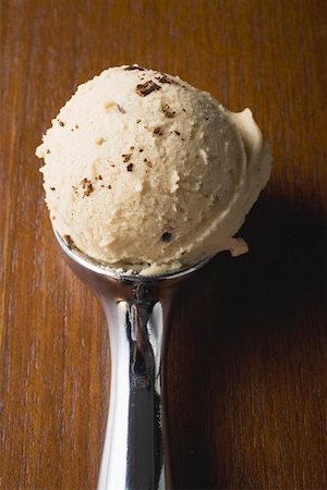 Scoop of ice cream in ice cream scoop (overhead view) Stock Photo - Premium Royalty-Free, Code: 659-01862475
