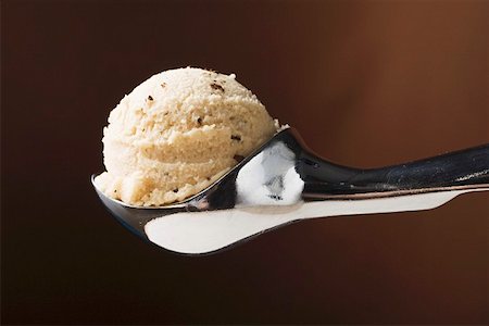 Scoop of ice cream in ice cream scoop Stock Photo - Premium Royalty-Free, Code: 659-01862473