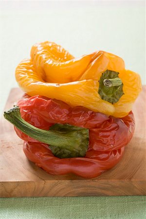 Grilled peppers on chopping board Stock Photo - Premium Royalty-Free, Code: 659-01862518