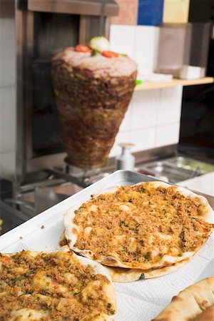 snack bar - Pizza with mince in a snack bar (Turkey) Stock Photo - Premium Royalty-Free, Code: 659-01862667