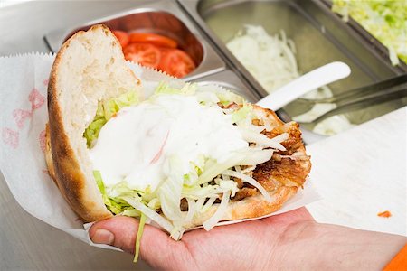 doner kebap kebab - Döner kebab with onions and yoghurt (opened) Stock Photo - Premium Royalty-Free, Code: 659-01862721