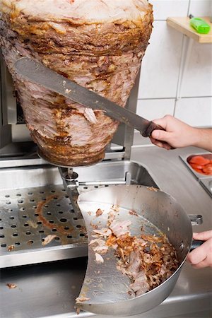 doner kebap kebab - Slicing a döner kebab Stock Photo - Premium Royalty-Free, Code: 659-01862737