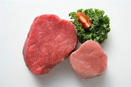 simsearch:659-01862764,k - Beef fillet and pork fillet, garnished with parsley Foto de stock - Royalty Free Premium, Número: 659-01862768