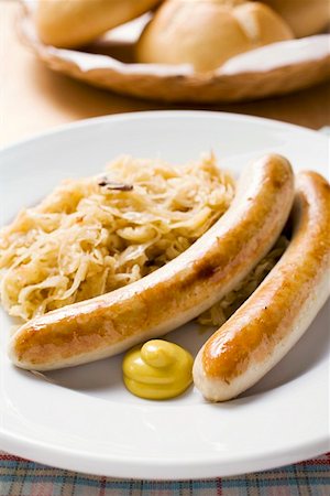 simsearch:659-01864043,k - Sausages with sauerkraut and mustard Foto de stock - Sin royalties Premium, Código: 659-01863068