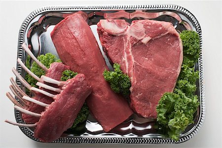 simsearch:659-01867471,k - Various types of meat on tray Foto de stock - Royalty Free Premium, Número: 659-01863379