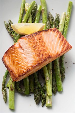 fillet - Fried salmon fillet on green asparagus Stock Photo - Premium Royalty-Free, Code: 659-01863385