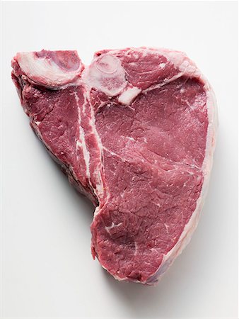 T-bone steak Stock Photo - Premium Royalty-Free, Code: 659-01863409