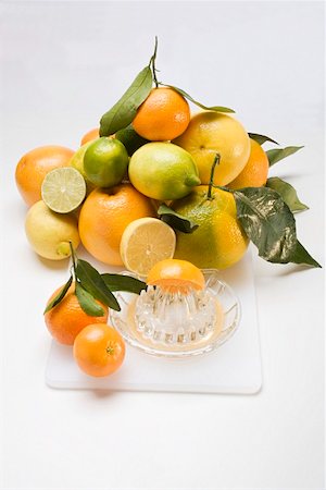 simsearch:659-03525022,k - Assorted citrus fruit with citrus squeezer Stock Photo - Premium Royalty-Free, Code: 659-01863539