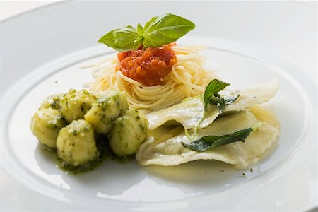 simsearch:659-01863699,k - Spaghetti, gnocchi and ravioli on a plate Stock Photo - Premium Royalty-Free, Code: 659-01863700