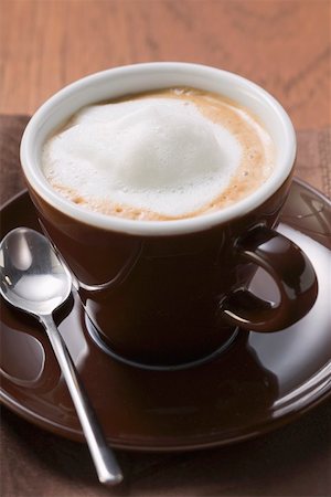 simsearch:659-07026887,k - Cappuccino in brown cup and saucer Foto de stock - Sin royalties Premium, Código: 659-01863827