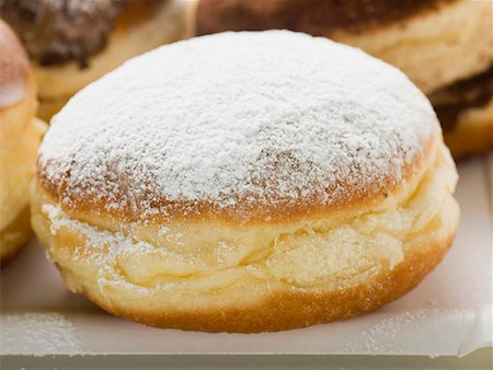 powdered sugar - Doughnut with icing sugar Stock Photo - Premium Royalty-Free, Code: 659-01863924