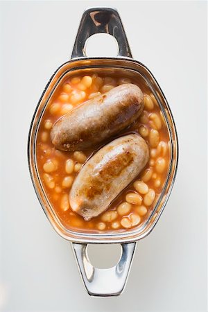 Baked beans with sausages (overhead view) Stock Photo - Premium Royalty-Free, Code: 659-01863973