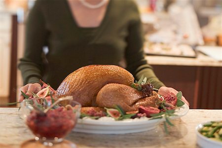 elegant kitchens - Woman with roast turkey in kitchen (Christmas) Stock Photo - Premium Royalty-Free, Code: 659-02214003