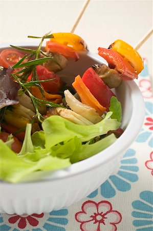 Salad leaves with mixed vegetable skewers (detail) Stock Photo - Premium Royalty-Free, Code: 659-02214044