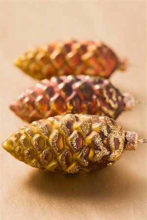 pine cone decorations - Three fir cones (Christmas tree ornaments) Stock Photo - Premium Royalty-Free, Code: 659-02214086