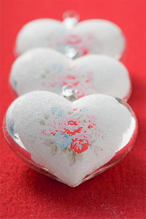 simsearch:659-02214107,k - Three silver hearts with rose motifs (Xmas tree ornaments) Stock Photo - Premium Royalty-Free, Code: 659-02214093