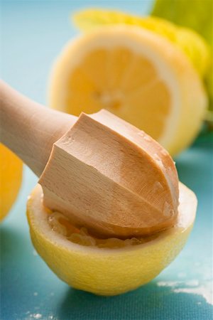 Squeezing a lemon Stock Photo - Premium Royalty-Free, Code: 659-02214272