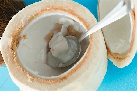 simsearch:659-02213538,k - Coconut, shelled and hollowed out with spoon Foto de stock - Sin royalties Premium, Código: 659-02214290