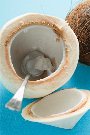 Coconut, shelled and hollowed out with spoon Stock Photo - Premium Royalty-Free, Code: 659-02214291