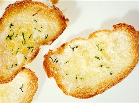 pan de ajo - Garlic baguette Foto de stock - Sin royalties Premium, Código: 659-02210927