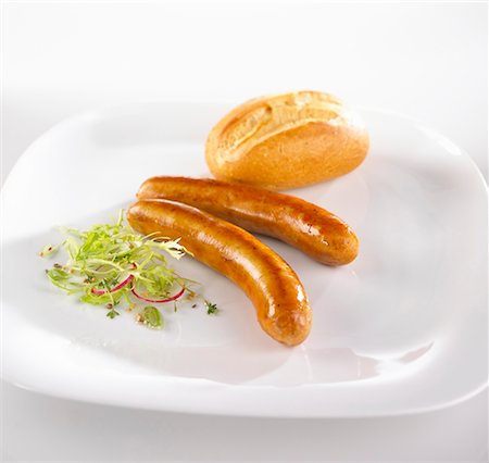 Sausages (Bratwurst) with bread roll Stock Photo - Premium Royalty-Free, Code: 659-02211183