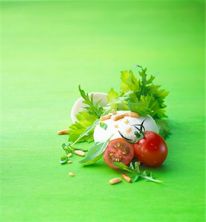 Mozzarella with salad leaves and tomatoes Stock Photo - Premium Royalty-Free, Code: 659-02211194