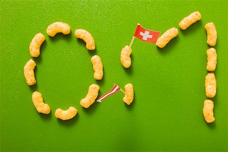 peanut flip - 0:1 written in peanut puffs, flags of Austria & Switzerland Stock Photo - Premium Royalty-Free, Code: 659-02211330