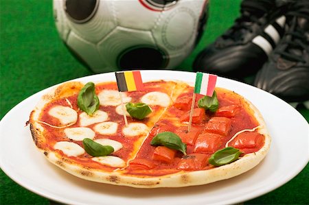soccer ball as pizza - Pizza with the flags of Belgium and Italy Stock Photo - Premium Royalty-Free, Code: 659-02211332