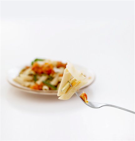 rigate - Penne on fork Stock Photo - Premium Royalty-Free, Code: 659-02211342