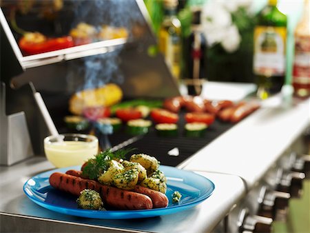 simsearch:659-03530030,k - Grilled sausages with dill potatoes Stock Photo - Premium Royalty-Free, Code: 659-02211449