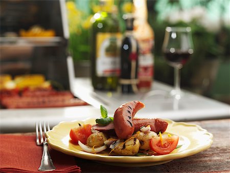 Grilled sausages with potatoes Stock Photo - Premium Royalty-Free, Code: 659-02211450