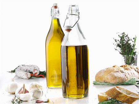 edible oil - Olive oil, garlic, salami, herbs and ciabatta Stock Photo - Premium Royalty-Free, Code: 659-02211453