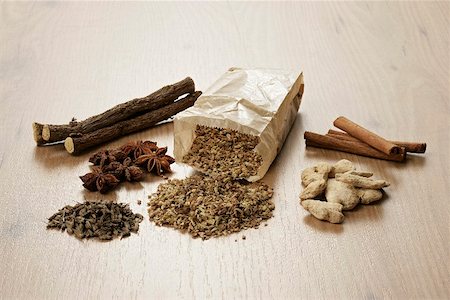 Tea ingredients (liquorice, ginger, anise, cinnamon, fennel, aniseed) Stock Photo - Premium Royalty-Free, Code: 659-02211619