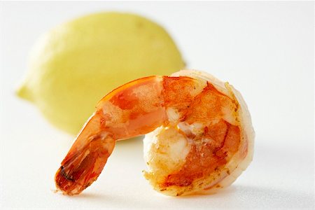 simsearch:659-07610222,k - Fried prawn and a lemon Stock Photo - Premium Royalty-Free, Code: 659-02211657