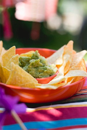 Guacamole with tortilla chips Stock Photo - Premium Royalty-Free, Code: 659-02211830