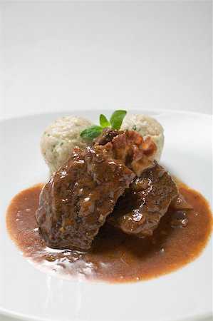 simsearch:659-06903477,k - Beef goulash with bread dumplings Fotografie stock - Premium Royalty-Free, Codice: 659-02211942