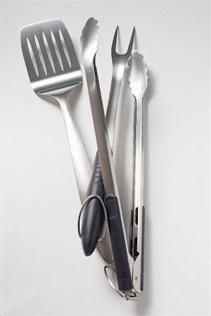 pancake spatula - Barbecue tools (tongs, carving fork, spatula) Foto de stock - Sin royalties Premium, Código: 659-02212024