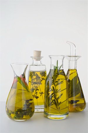 simsearch:659-02212280,k - Four different herb oils in bottles Stock Photo - Premium Royalty-Free, Code: 659-02212279