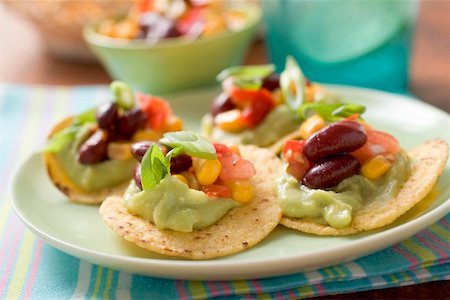 Tortilla chips with guacamole and salsa Stock Photo - Premium Royalty-Free, Code: 659-02212571