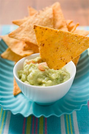 Nachos with guacamole Foto de stock - Sin royalties Premium, Código: 659-02212572