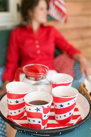 rustic tray - Coffee in paper cups on tray, woman in background Stock Photo - Premium Royalty-Free, Code: 659-02212597