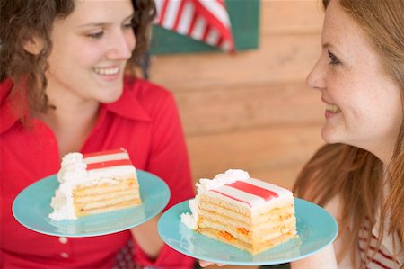 simsearch:659-02212116,k - Women holding pieces of cake on plates (4th of July, USA) Stock Photo - Premium Royalty-Free, Code: 659-02212603