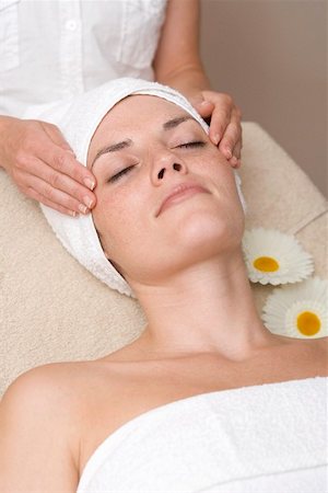 Woman having beauty treatment (face massage) Stock Photo - Premium Royalty-Free, Code: 659-02212820