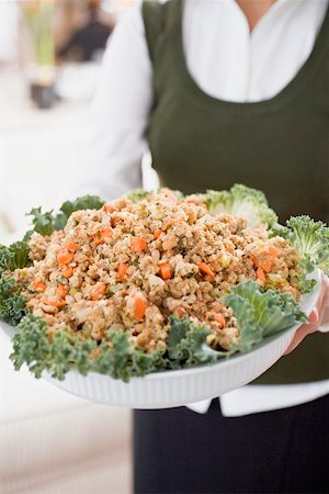 simsearch:659-02212726,k - Woman holding large dish of bread stuffing Foto de stock - Sin royalties Premium, Código: 659-02212906