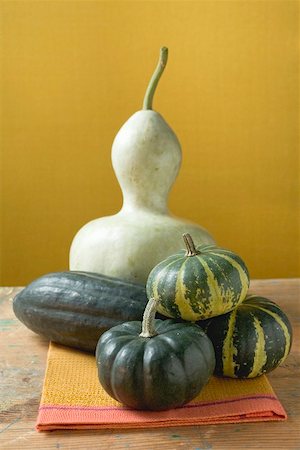 pumpkin still - Various pumpkins and squashes on cloth Stock Photo - Premium Royalty-Free, Code: 659-02212957